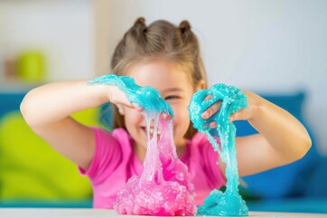 little-girl-making-homemade-slime-toy-little-girl-making-homemade-slime-toy.jpeg