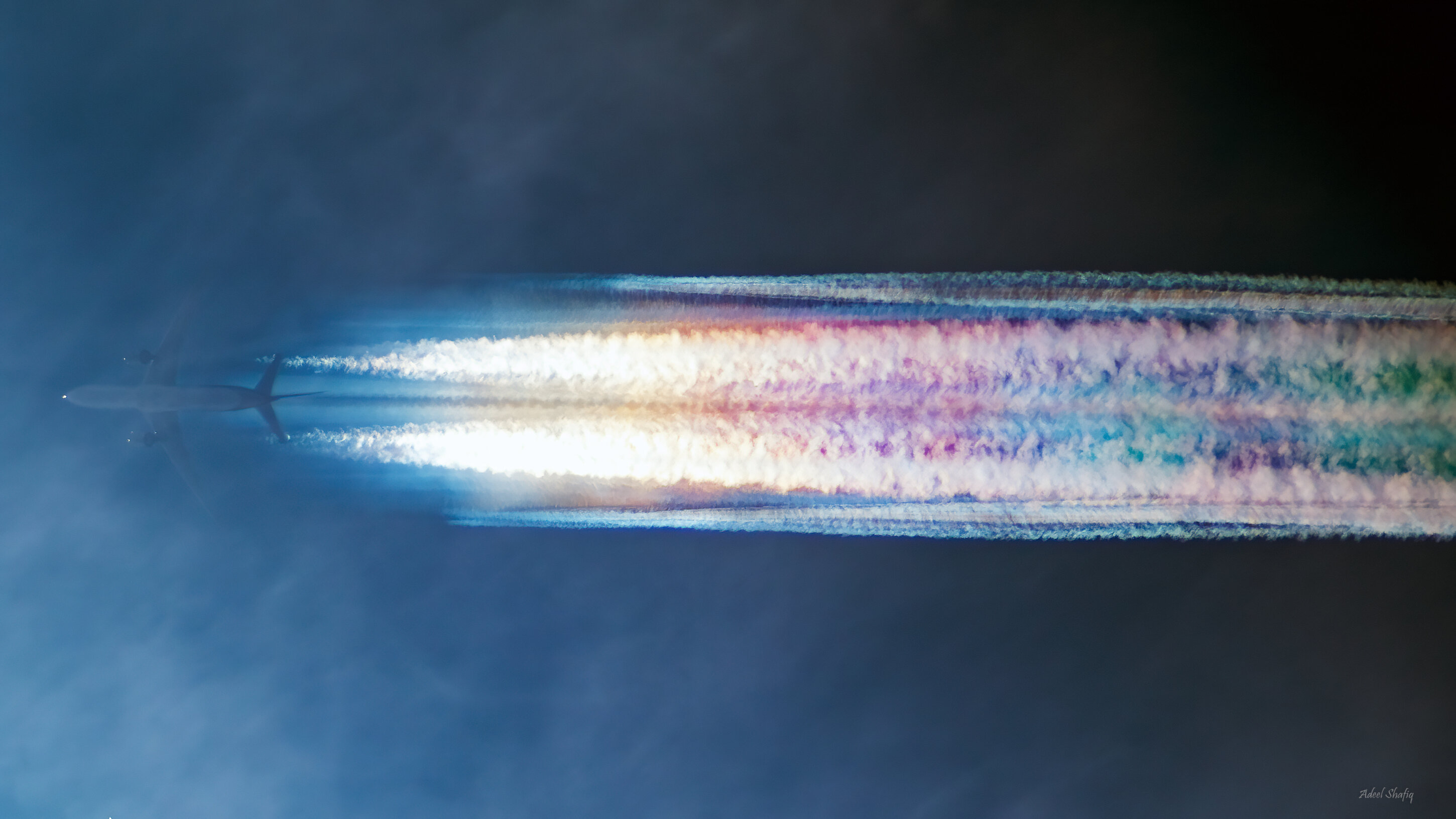 Aircraft contrails and iridescence
