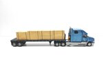 camion-mack-vision-trasporto-legna-del-2002-143-camion-americani-deagostini