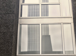  reflection in the window, reflection of a skyscraper,