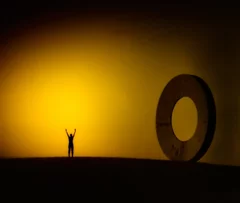 stone circle in Volterra, Italy, photographed against the light