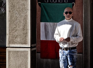  tricolour flag, man in white 