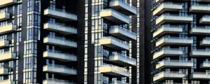 Close-up detail of high-rise buildings with staggered cantilevered balconies, Piazza Gae Aulenti, Milan