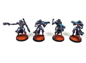 Four Nomad Hollow Men miniatures for Infinity The Game, painted in grey and blue-toned armor with glowing cyan visors by RosPaint Studio. Four Nomad Hollow Men miniatures for Infinity The Game, painted in grey and blue-toned armor with glowing cyan visors by RosPaint Studio.