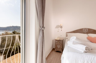 superior%20ruspoli%20vista%20lago%20e%20letto%20matrimoniale.jpeg