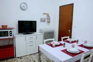 JTdCJTIyaXQlMjIlM0ElMjJDdWNpbmElMjBkZWxsJUUyJTgwJTk5QXBwYXJ0YW1lbnRvJTIwTWFyZSUyMGElMjBQb3J0b3BhbG8lMjBkaSUyMENhcG8lMjBQYXNzZXJvJTIyJTdE