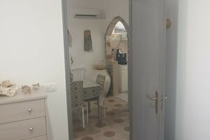 Camera con letto matrimoniale e vista su zona pranzo, Villetta Marisella a Pachino
