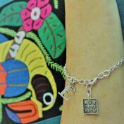 Gioielli in zama argentata con iniziali