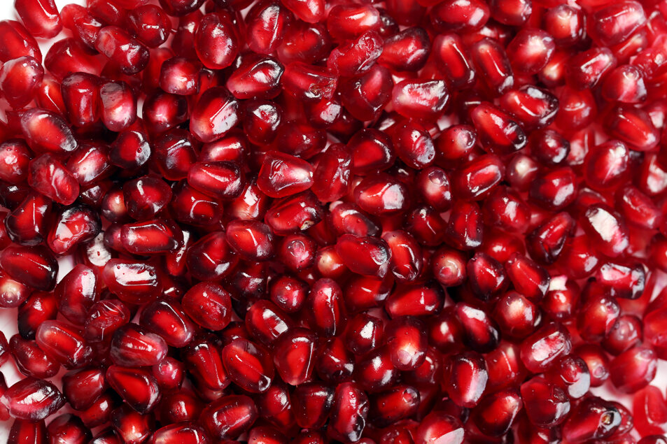 exotic-delicious-pomegranate-white-background.jpeg