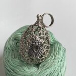 egg-of-exclusive-silver-masks-and-emeralds-romeo-crotone-mod-5635-cb850