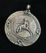 taras-on-dolphin-pendant-with-coin-romeo-crotone-mod-5379