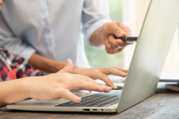 business-woman-typing-laptop-workplace-woman-working-office-hand-keyboard