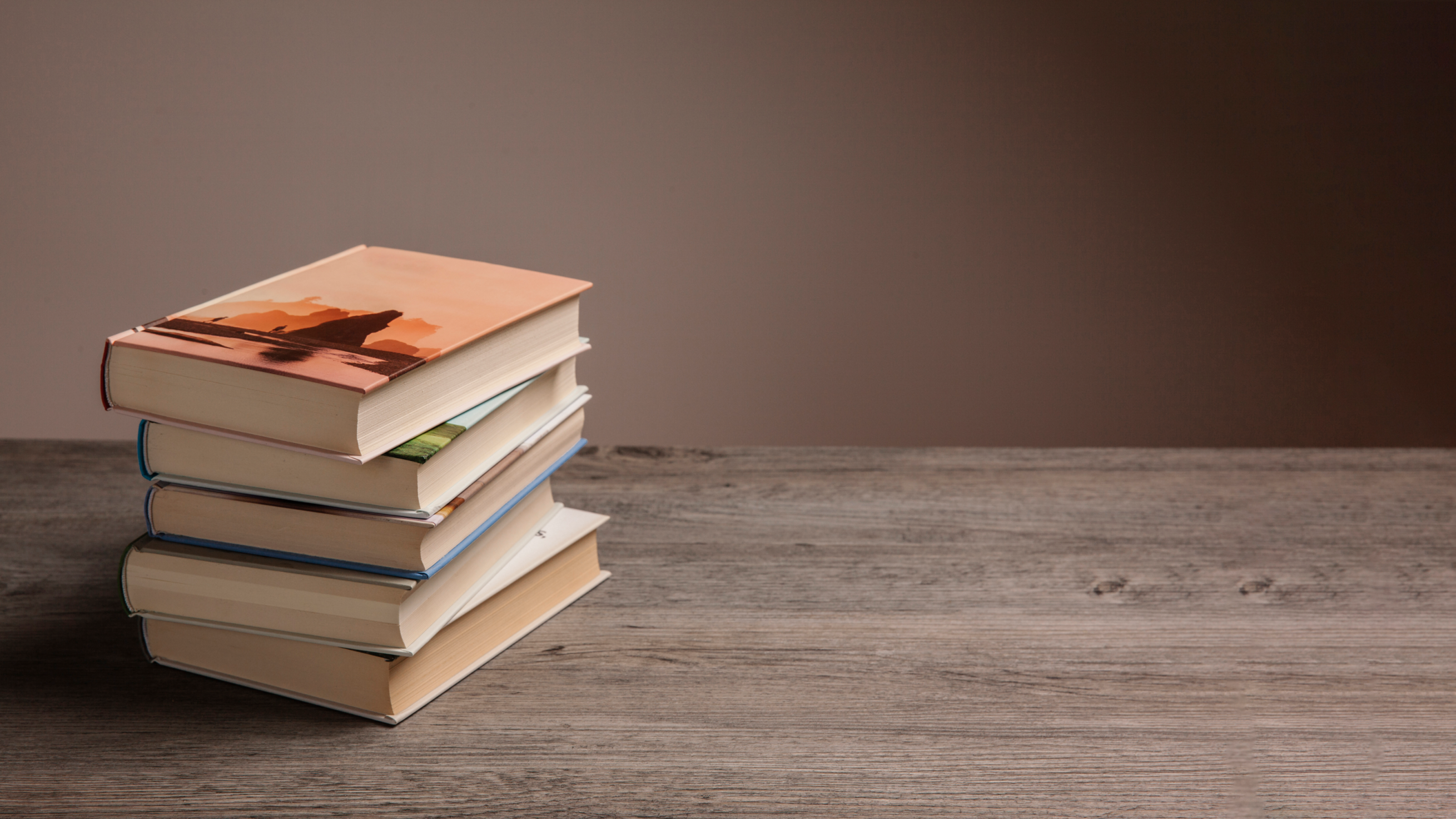 stack-of-books-and-space-on-right stack-of-books-and-space-on-right