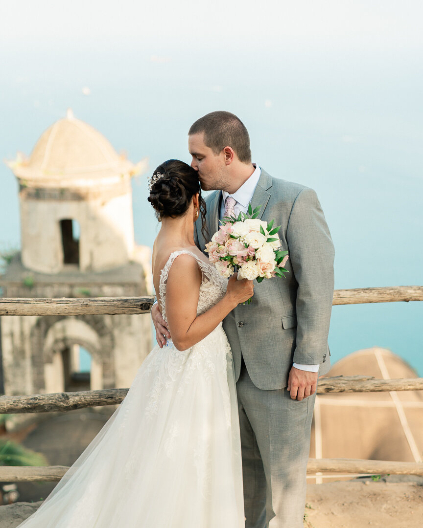 mgl04445.jpeg Bride and groom kissing in Ravello with a splendid view of the sea
