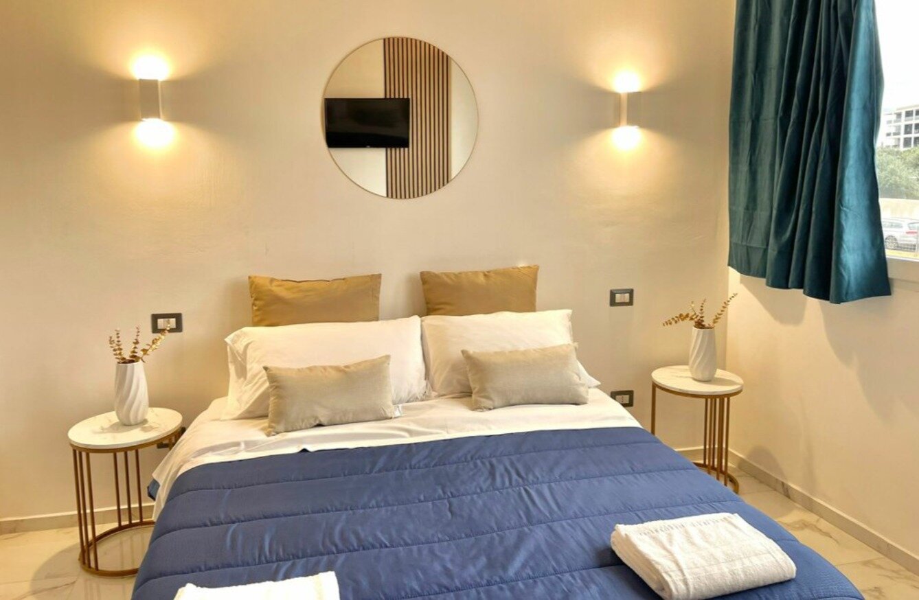 RIFUNZIONALIZZAZIONE EDIFICIO PER REALIZZAZIONE DI SUITES B&B