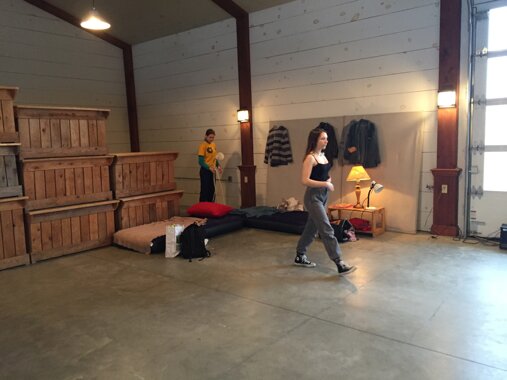 Performer rehearsing movement in a spacious studio setting Performer rehearsing movement in a spacious studio setting
