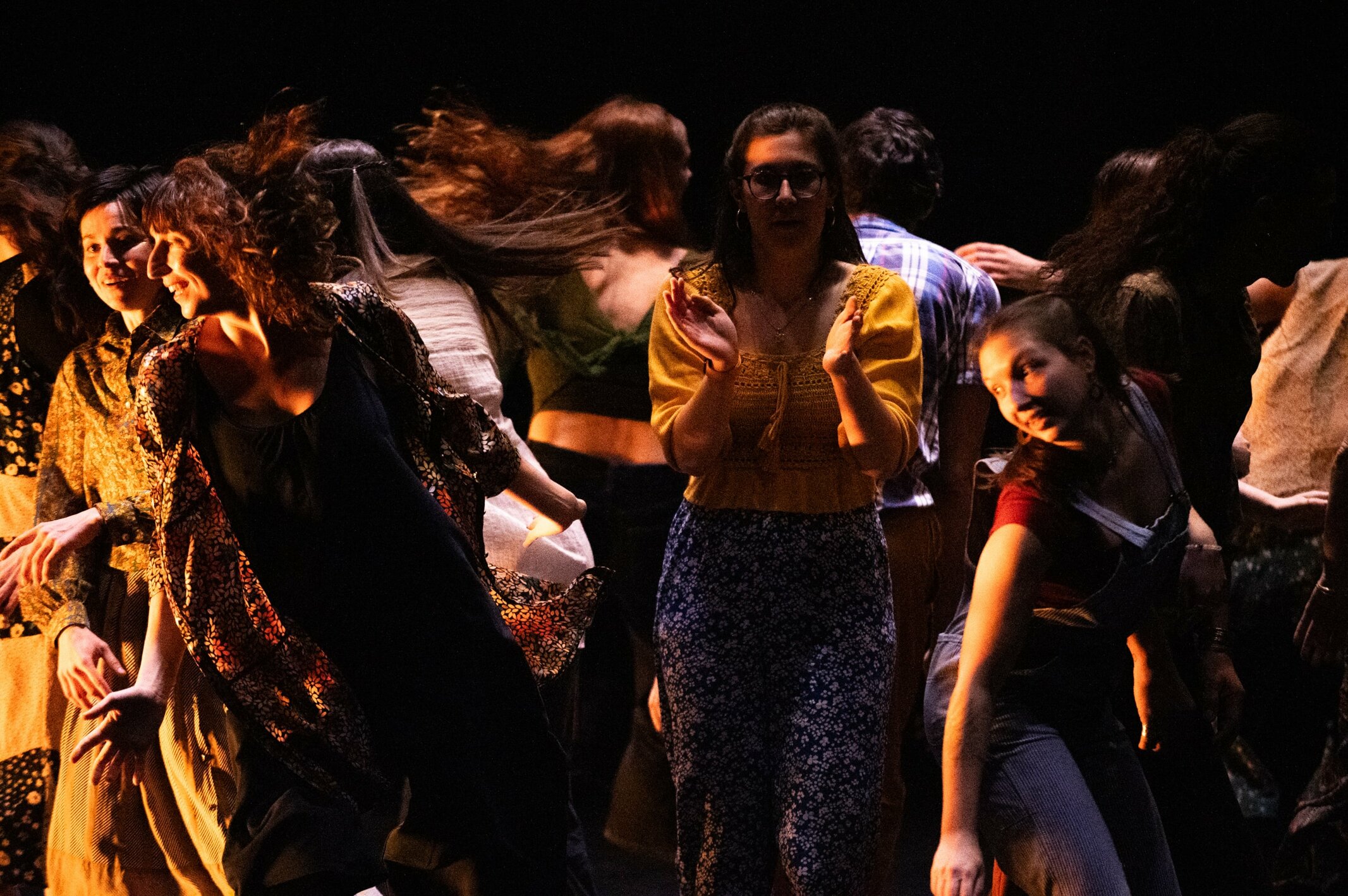 Dancers performing on stage during an Axis Syllabus movement training