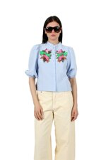 blue-shirt-with-voluminous-sleeves
