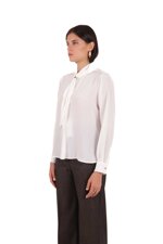 silk-shirt-with-scarf-and-metal-neck-clasp