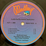 laid-backkeep-smiling-1983