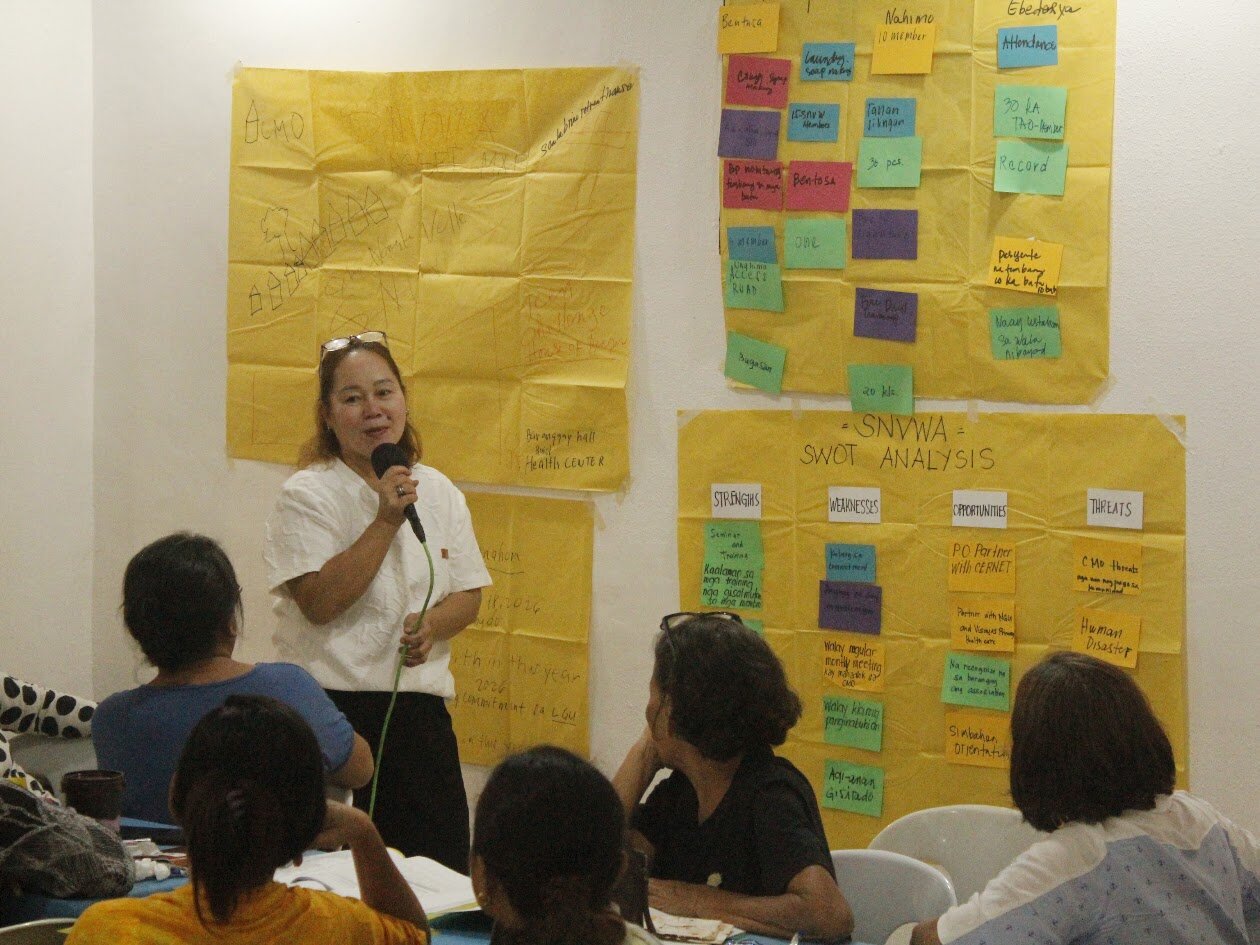 15.--a-leader-of-the-sitio-nangka-ville-women_s-association-presents-their-workshop-results.jpeg 15.--a-leader-of-the-sitio-nangka-ville-women_s-association-presents-their-workshop-results.jpeg