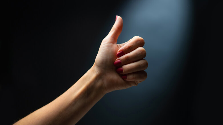 hand-shows-sign-fine-holding-finger-up-concept-gesture-communication.jpeg