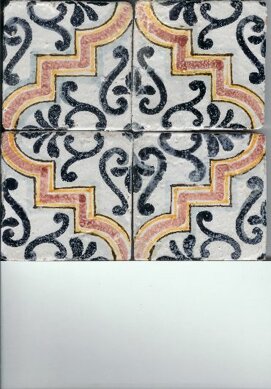 Sicilian tiles with intricate black and orange patterns, handcrafted ceramic design