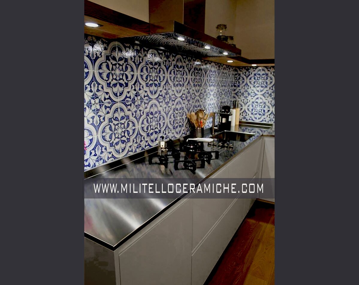 Modern kitchen with Sicilian tiles backsplash in blue and white Mediterranean design.