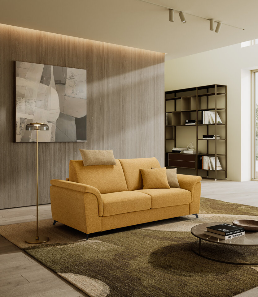 Divano letto artigianale Made in Italy in un salotto moderno con dettagli di design