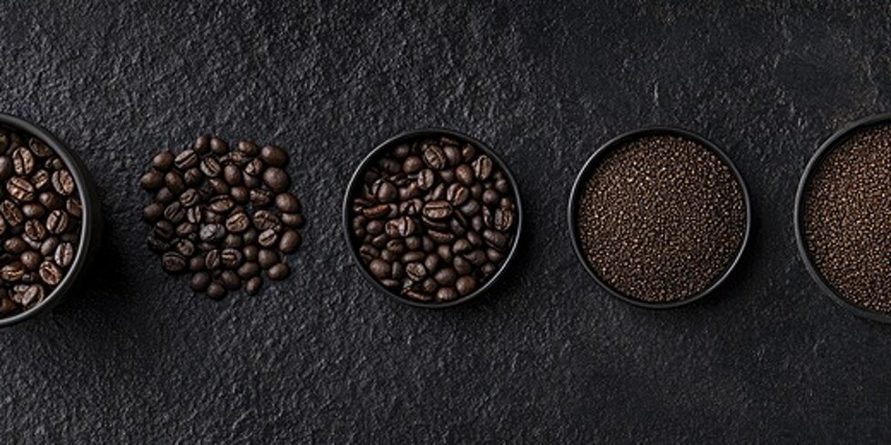 pngtree-coffee-beans-and-a-cup-on-black-background-image_17111223.jpeg