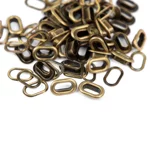 we-r-makers-oval-eyelet-refill-pack-silver-50-pcs
