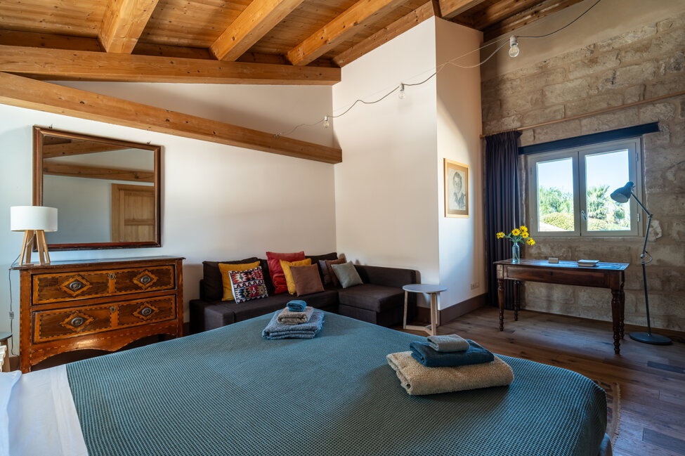 Intimate vacation room with wooden furniture and nature view