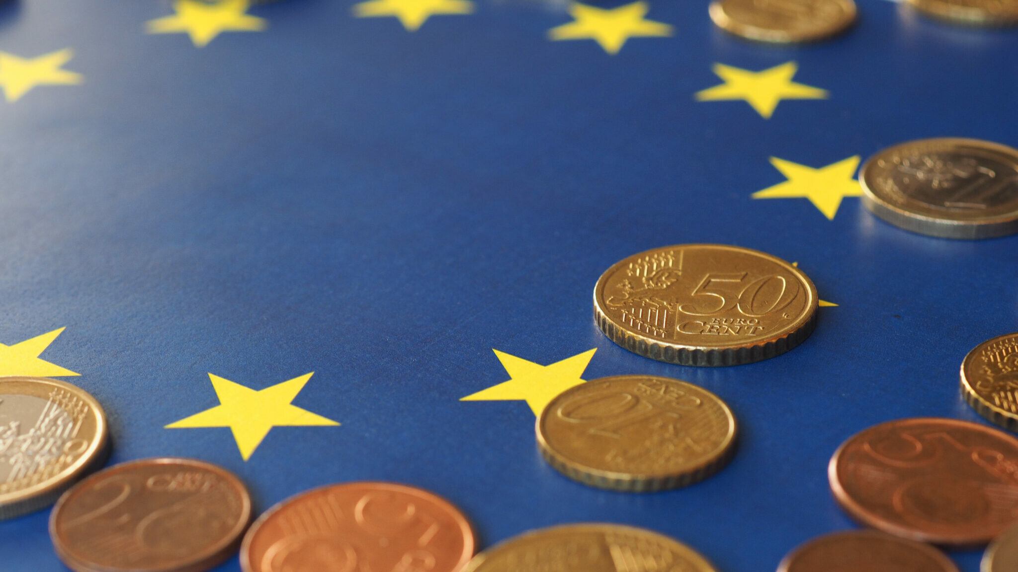 euro-coins-over-eu-flag-1789422-2048x1152-1.jpeg euro-coins-over-eu-flag-1789422-2048x1152-1.jpeg