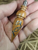 pendule-en-goncalo-alves-avec-vierge-gravee-en-resine
