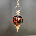 pendule-sephoroton-resine-rouge-noir