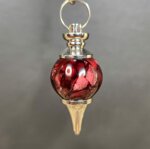 pendule-sephoroton-resine-rouge