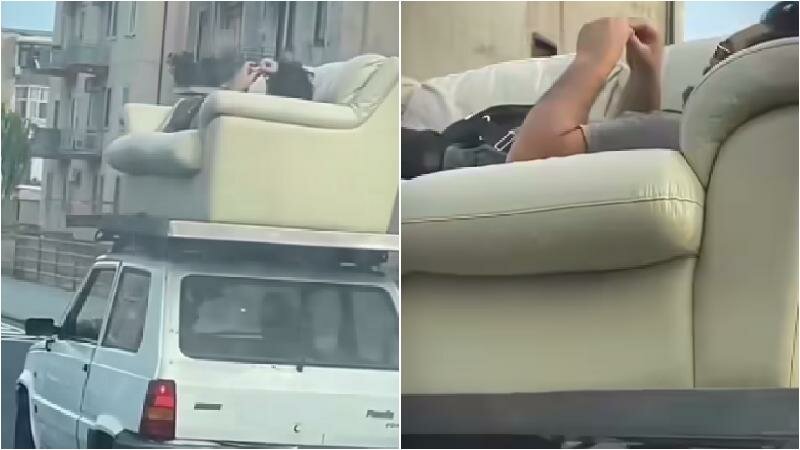 Scorrazza per Catania sdraiato sul 'divano tetto'