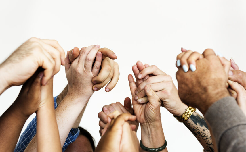 closeup-diverse-people-holding-hands.jpeg