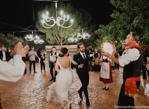 Outdoor Sicilian wedding celebration with music and dance