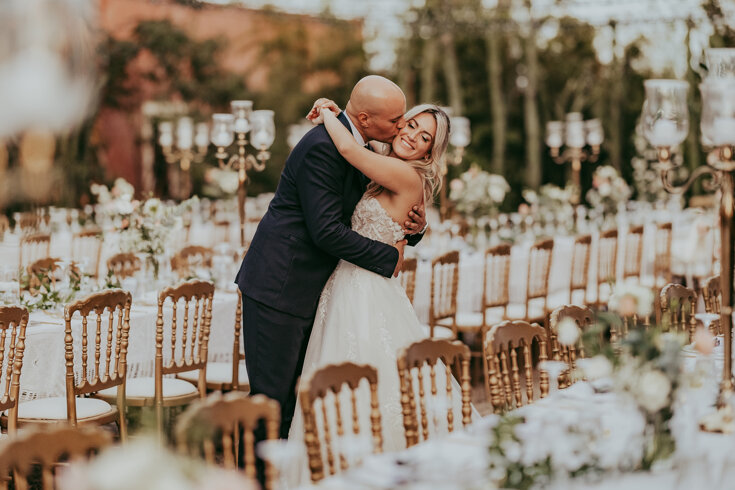 Bride and groom embracing at a luxury Sicilian wedding reception