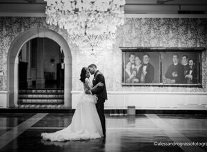 Elegant couple dancing in a luxurious Sicilian wedding venue