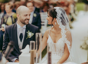 Bride and groom smiling at each other during a Sicily wedding ceremony