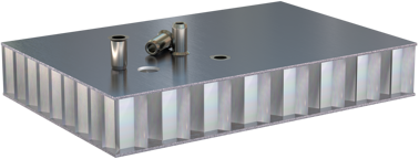 Inserimento inserti Ma in pannelli in alveolare alluminio Inserimento inserti Ma in pannelli in alveolare alluminio