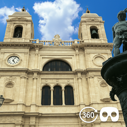 Facciata della Chiesa di San Rocco con statue e cielo blu