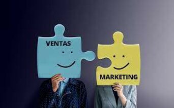 dos piezas de un puzle que encajan en una tiene el testo de Ventas y en la otra el texto de marketing
