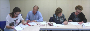 Alumnos trabajando en un ejercicio por parejas