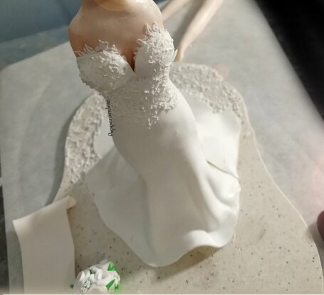 dettagli lavorazione abito sposa