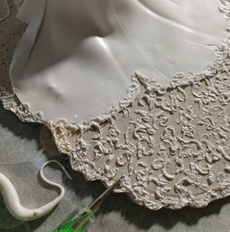 dettagli lavorazione vestito sposa