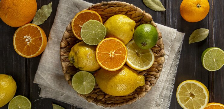 top-view-basket-oranges-limes.jpeg