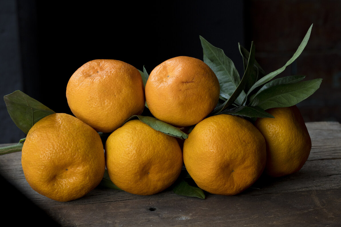 orange-mandarines-with-green-leaves.jpeg